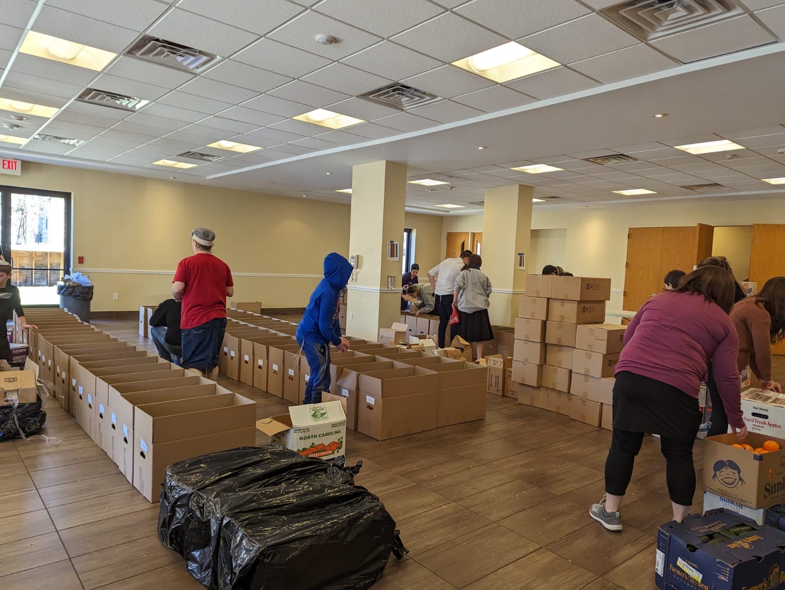 Volunteers packing Shabbos boxes